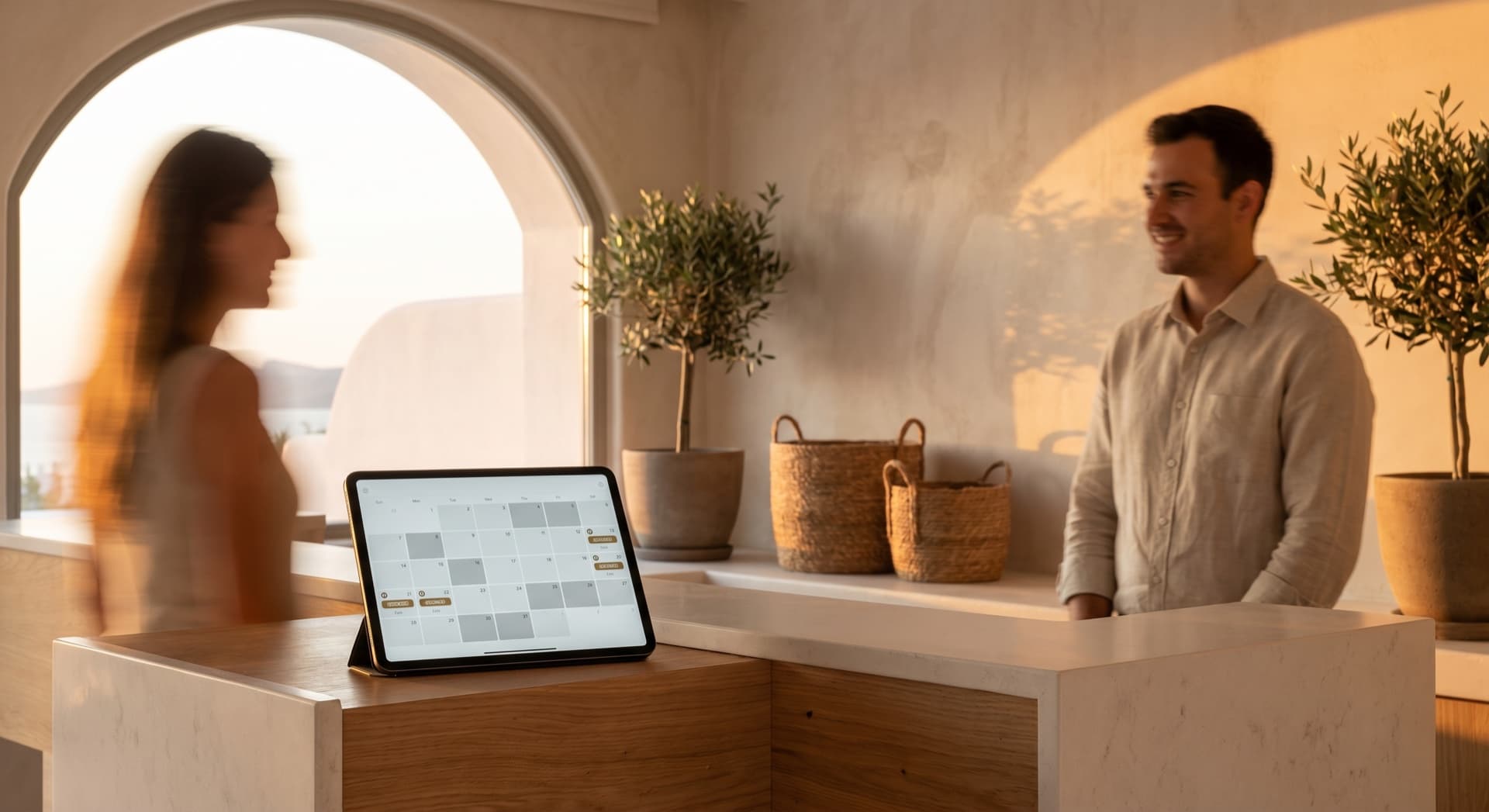 Greek hotel reception desk με tablet booking calendar interface